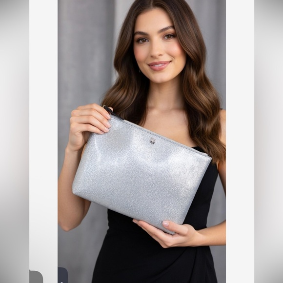 Kate Spade Handbags - Kate Spade Mavis Silver Glitter Pouch Clutch bag EUC